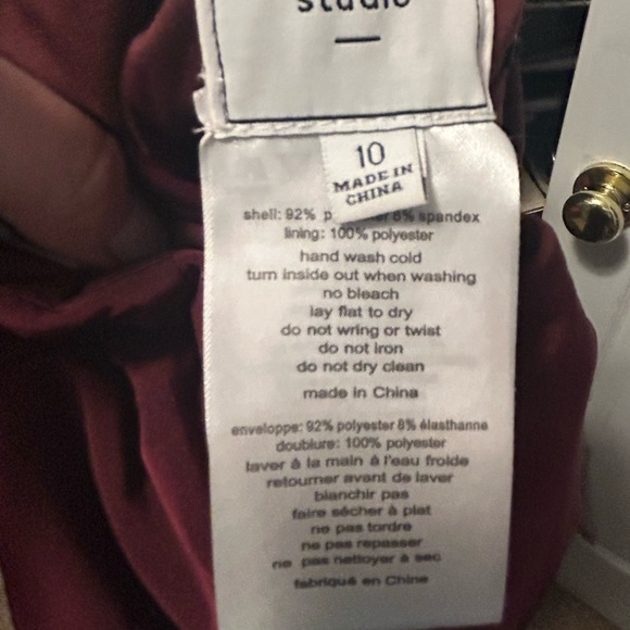 DB Studios bridesmaid dress. Form fitting with rouching on the side and a slit. - Picture 2 of 3